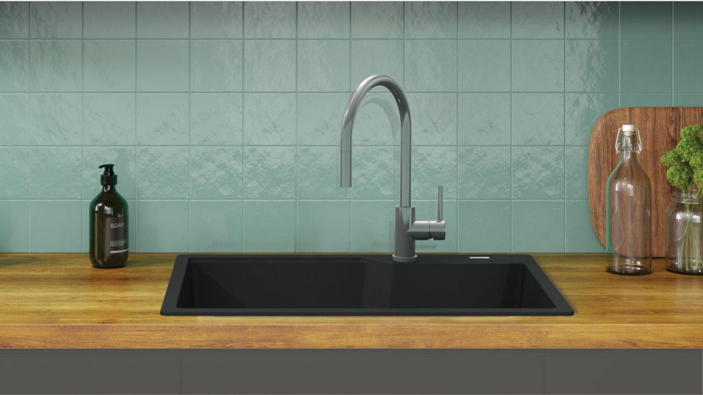 Stainles steel sink from kindred with flower details around