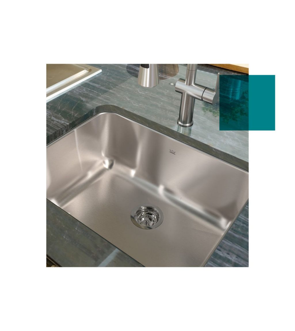 Kindred Steel Queen drop-in double bowl kitchen sink in an island with wood countertops